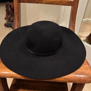 Sophisticated black wool blend floppy hat.